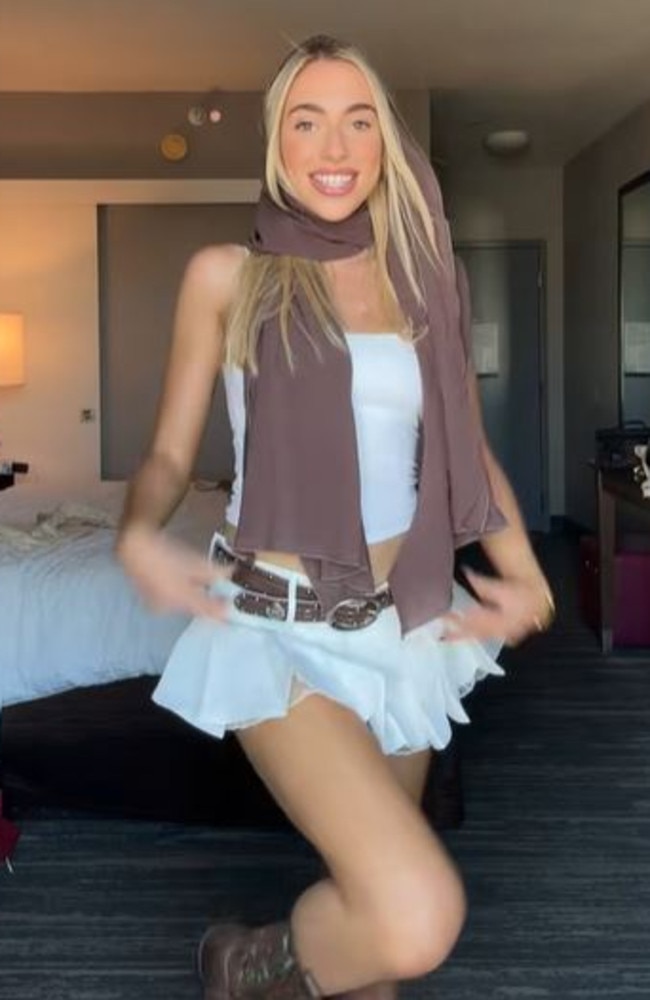 Jaz Hand Made social media coordinator Katie Gulle wore a white mini skirt and white tube top with a scarf for the event. Picture: Instagram/Katie Gulle