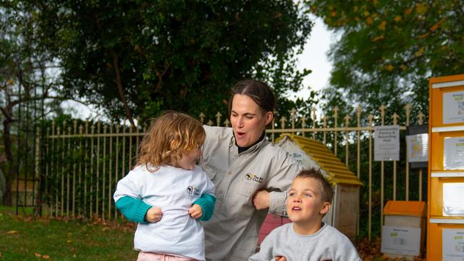 Alexis Bowen with her children Margot and Logan who started picking up litter on their evening walks.