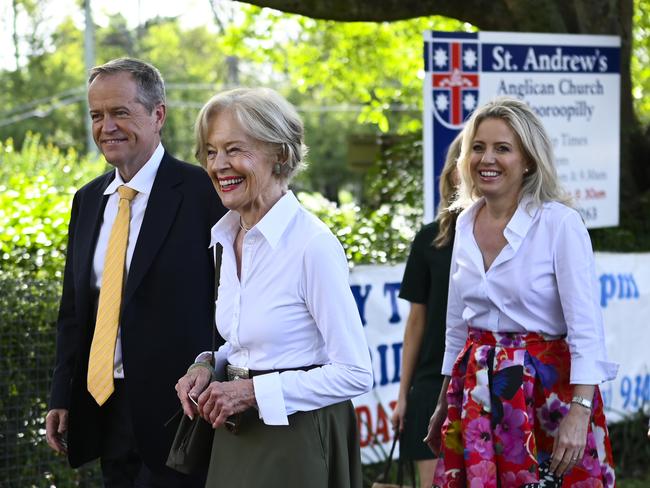 Bill Shorten, arriving for Easter service in Brisbane with wife Chloe and her family, was raised Catholic and shaped by Jesuits but made the switch to Anglicanism. Picture: AAP