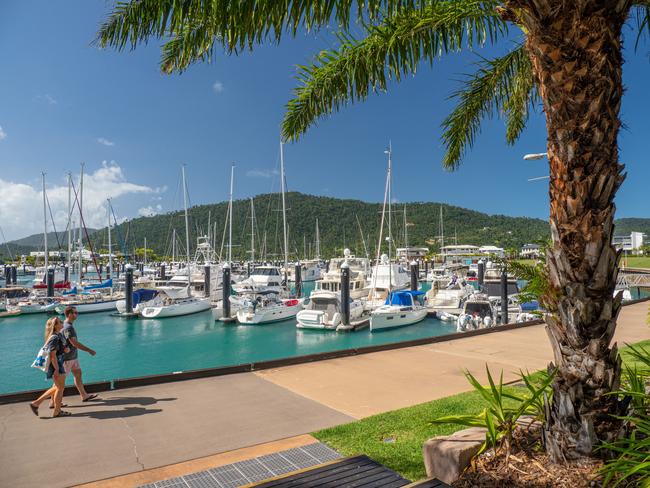 People walking along the marina waterfront, Coral Sea Marina, Airlie Beachcredit Mark Fitzescapedecember 6 2020destination whitsundays