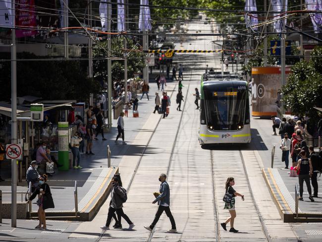 MELBOURNE, AUSTRALIA - NewsWire Photos OCTOBER 31, 2021: People in Melbourne are out and about today shopping in Bourke Street Mall and enjoying their freedom from lockdown as Victoria reaches 80% vaccination rate. Picture: NCA NewsWire / Paul Jeffers