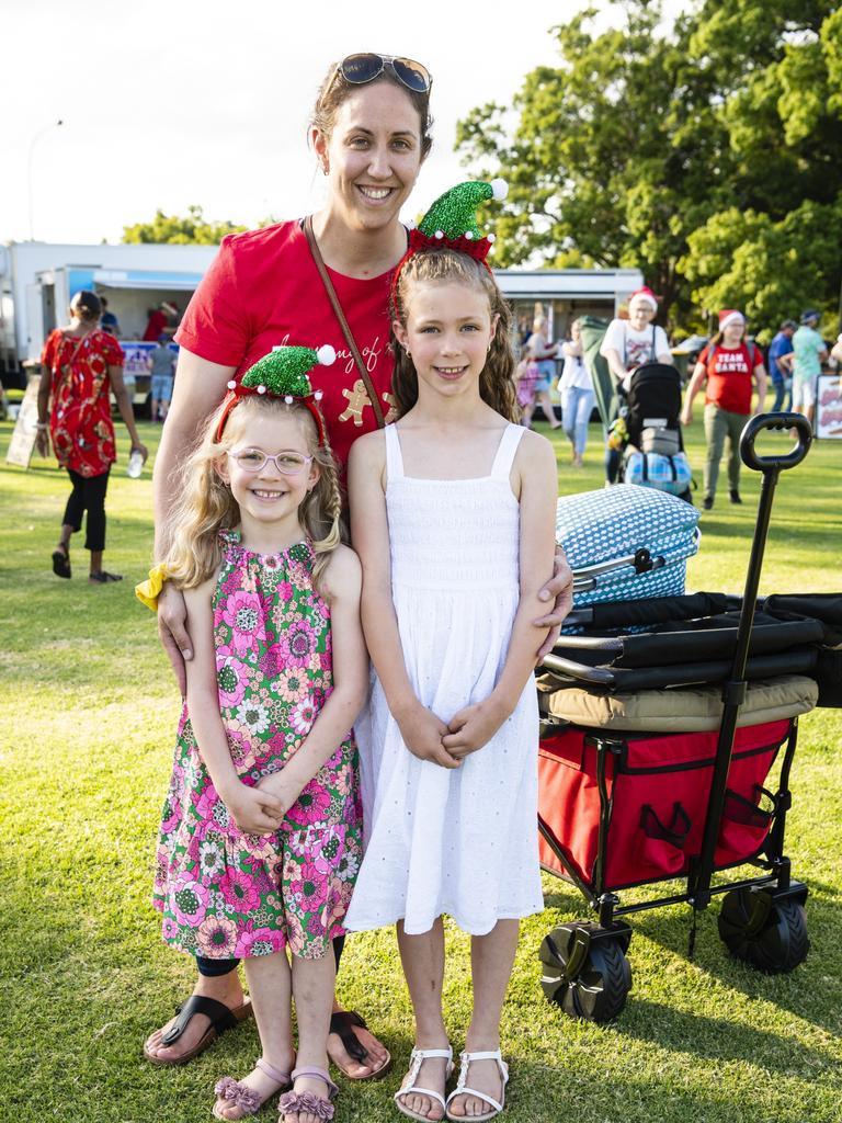 Casey Earixson with daughters Ivy (left) and Lily Earixson at the Triple M Mayoral Carols by Candlelight, Sunday, December 11, 2022. Picture: Kevin Farmer