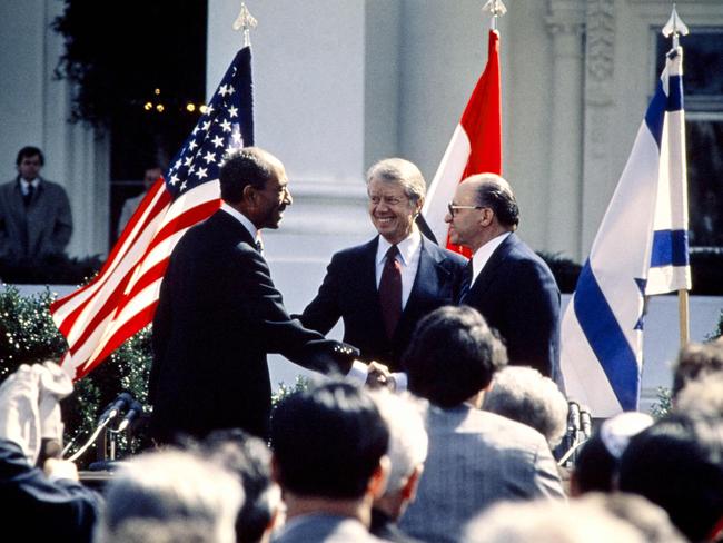 Former US president Jimmy Carter with former Egyptian president Anwar al-Sadat and former Israeli premier Menachem Begin.