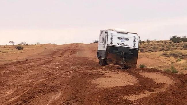 A caravan became stranded on the Oodnadatta Track last month due to heavy rain. Picture: Supplied