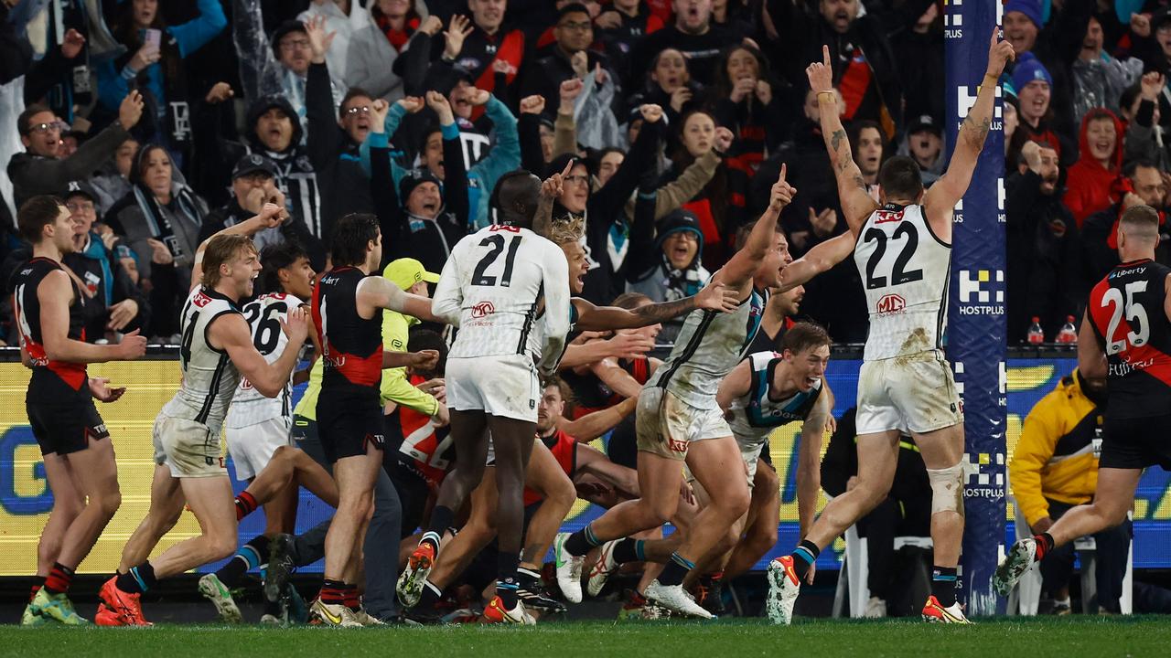 Port Adelaide players celebrate after Dan Houston’s incredible kick. Picture: Getty Images