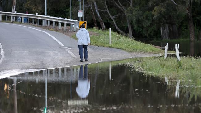 Forbes locals woke to the rising flood waters at 10.35m at the iron bridge on the city outskirts. Picture: Gary Ramage