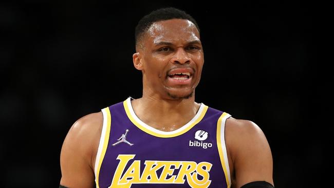 LOS ANGELES, CALIFORNIA - FEBRUARY 16: Russell Westbrook #0 of the Los Angeles Lakers reacts to a play during the first quarter against the Utah Jazz at Crypto.com Arena on February 16, 2022 in Los Angeles, California. NOTE TO USER: User expressly acknowledges and agrees that, by downloading and or using this Photograph, user is consenting to the terms and conditions of the Getty Images License Agreement.   Katelyn Mulcahy/Getty Images/AFP == FOR NEWSPAPERS, INTERNET, TELCOS & TELEVISION USE ONLY ==