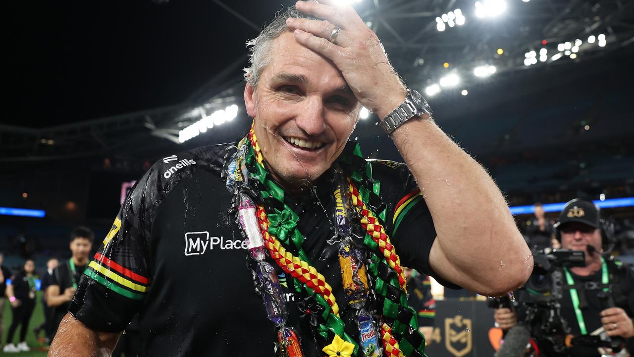 SYDNEY, AUSTRALIA - OCTOBER 06: Ivan Cleary, coach of the Panthers reacts after having water thrown over him in celebration after winning the 2024 NRL Grand Final match between the Melbourne Storm and the Penrith Panthers at Accor Stadium on October 06, 2024, in Sydney, Australia. (Photo by Cameron Spencer/Getty Images)