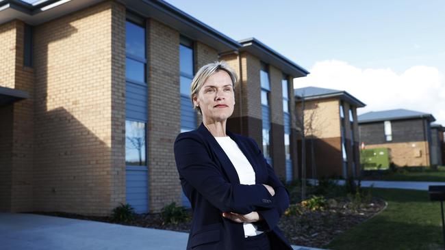 Labor Lyons MP Jen Butler in front of a block of newly-built homes in Gagebrook. Picture: Zak Simmonds