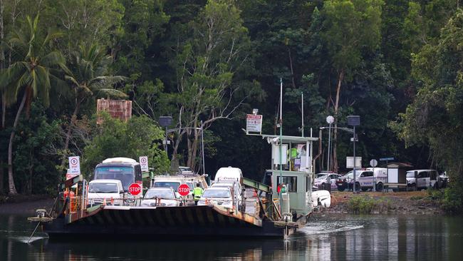 A police check point at Daintree River ferry crossing. At least three more of the foreign nationals were picked up nearby this morning. Picture: Marc McCormack