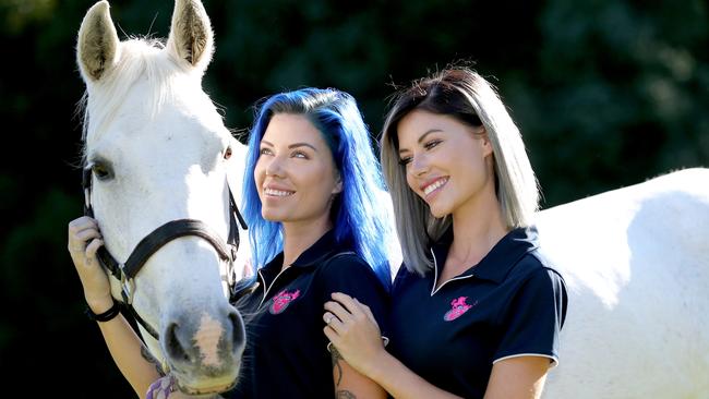 Gold Coast DJ twins, Brooke and Ellie Kelaart, founders of Project Ponies, a rescue and rehabilitation program for ill-treated horses destined for slaughter. Pictured with rescued horse Sadie. Picture: Mike Batterham