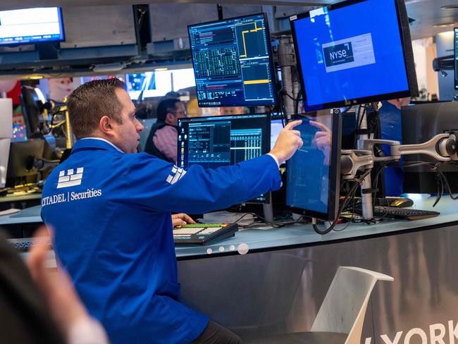 NEW YORK, NEW YORK - JANUARY 02: Traders work on the floor of the New York Stock Exchange (NYSE) on the first day of trading of the new year on January 02, 2025 in New York City. The Dow was up nearly 200 points in morning trading.   Spencer Platt/Getty Images/AFP (Photo by SPENCER PLATT / GETTY IMAGES NORTH AMERICA / Getty Images via AFP)