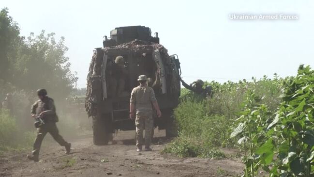 Ukrainian troops describe brutal, grinding battle