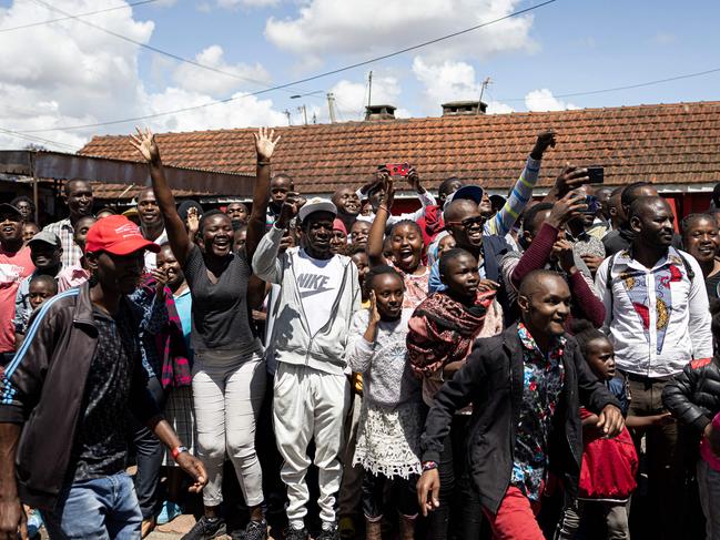 People react as King Charles III leaves the Eastland Library in Nairobi during a four-day state visit to Kenya. Picture: AFP