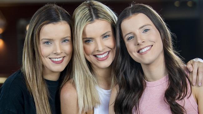 SA triplets Amy, Sophie and Kate Taeuber have a very successful podcast - Outspoken The Podcast pose together at The Moseley at Glenelg Monday,November,6,2023.Picture Mark Brake