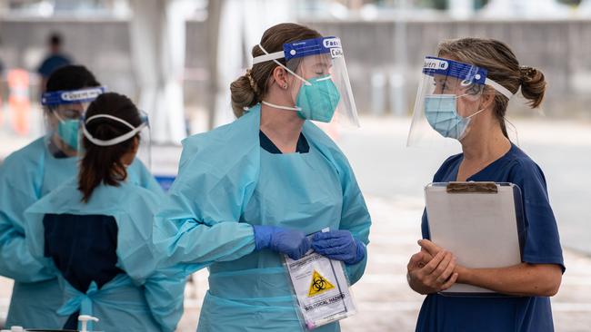 Healthcare workers at the drive through testing in Bondi Beach. Picture: NCA NewsWire / James Gourley