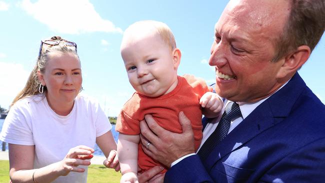 Premier Steven Miles with mother-of-three Charli Fouhy and her six-month-old baby Seamus Fouhy on the Sunshine Coast on Friday. Picture: Adam Head