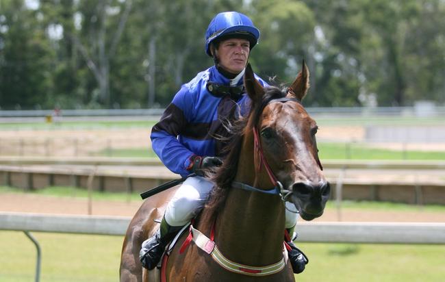 Luke Dillon on White Cap after winning the first race at Callaghan Park. Photo Chris Ison / The Morning Bulletin. Picture: Chris Ison