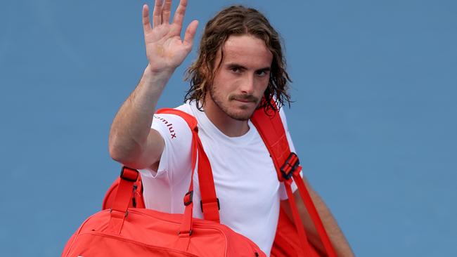 Stefanos Tsitsipas waves goodbye to those ranking points. Photo by Matthew Stockman/Getty Images.