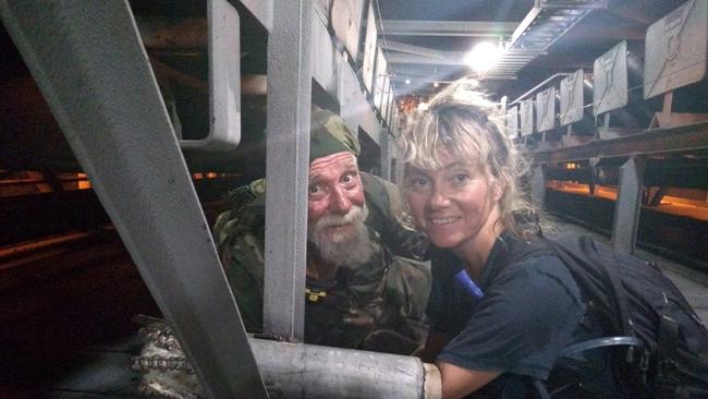 Lamont and another protester locked to a conveyor belt at the Abbot Point coal export terminal in 2019.