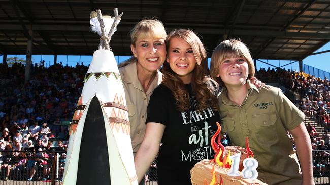 Bindi Irwin celebrates her 18th birthday with Terri Irwin and Robert at Australia Zoo earlier this year. Picture: Claudia Baxter