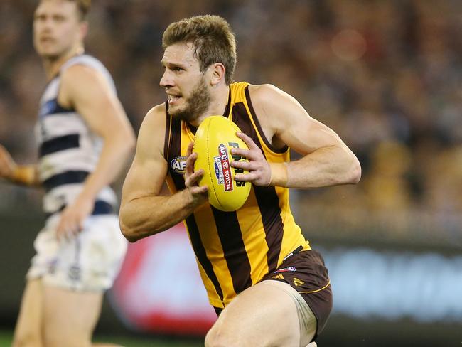 Second Qualifying Final. Geelong vs Hawthorn at the MCG. Grant Birchall cleans up across half back . Pic: Michael Klein