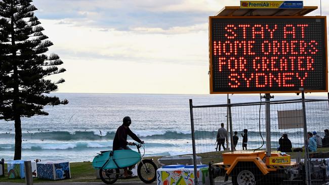 \People are seen exercising at Bondi Beach in Sydney. Picture: NCA NewsWire/Bianca De Marchi