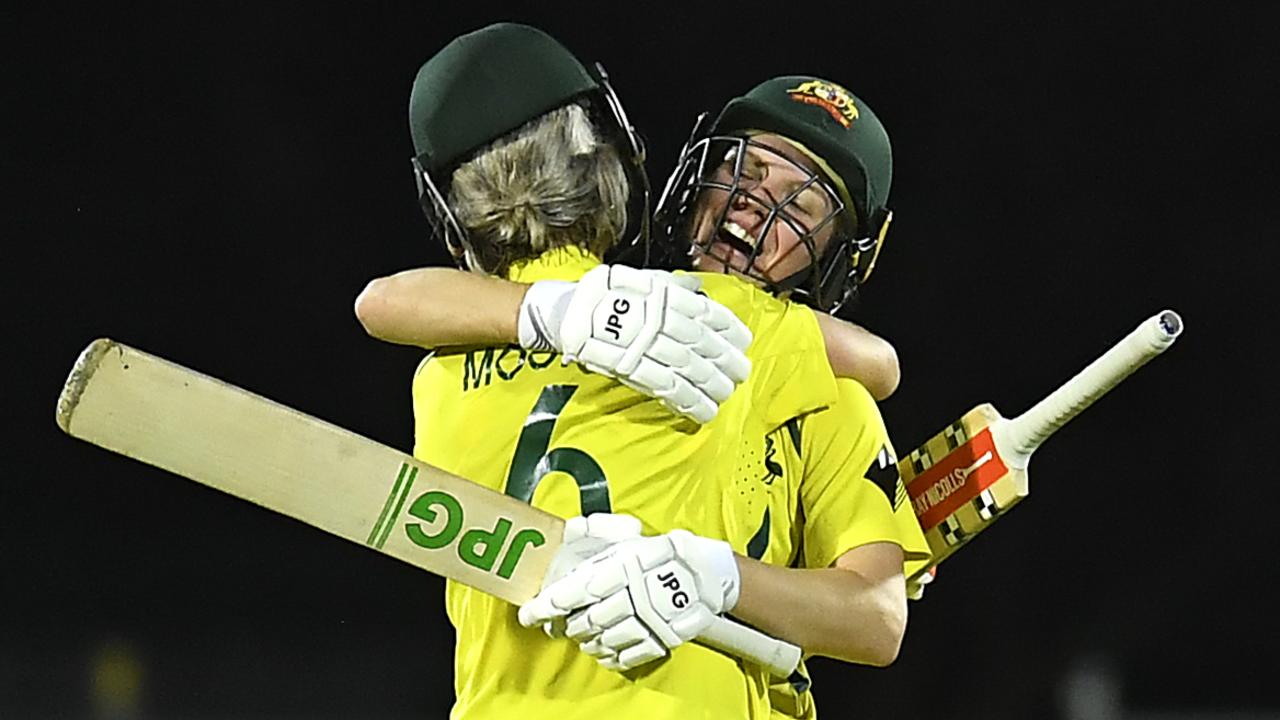 Beth Mooney and Nicola Carey celebrate the miraculous win. Photo by Albert Perez/Getty Images