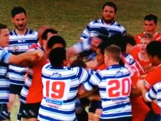 CAUGHT ON CAMERA: Players from Colts and Brothers A-grade teams throw punches as a big brawl unfolds after their game on Anzac Day. PHOTO COURTESY: CHANNEL 7 ROCKHAMPTON