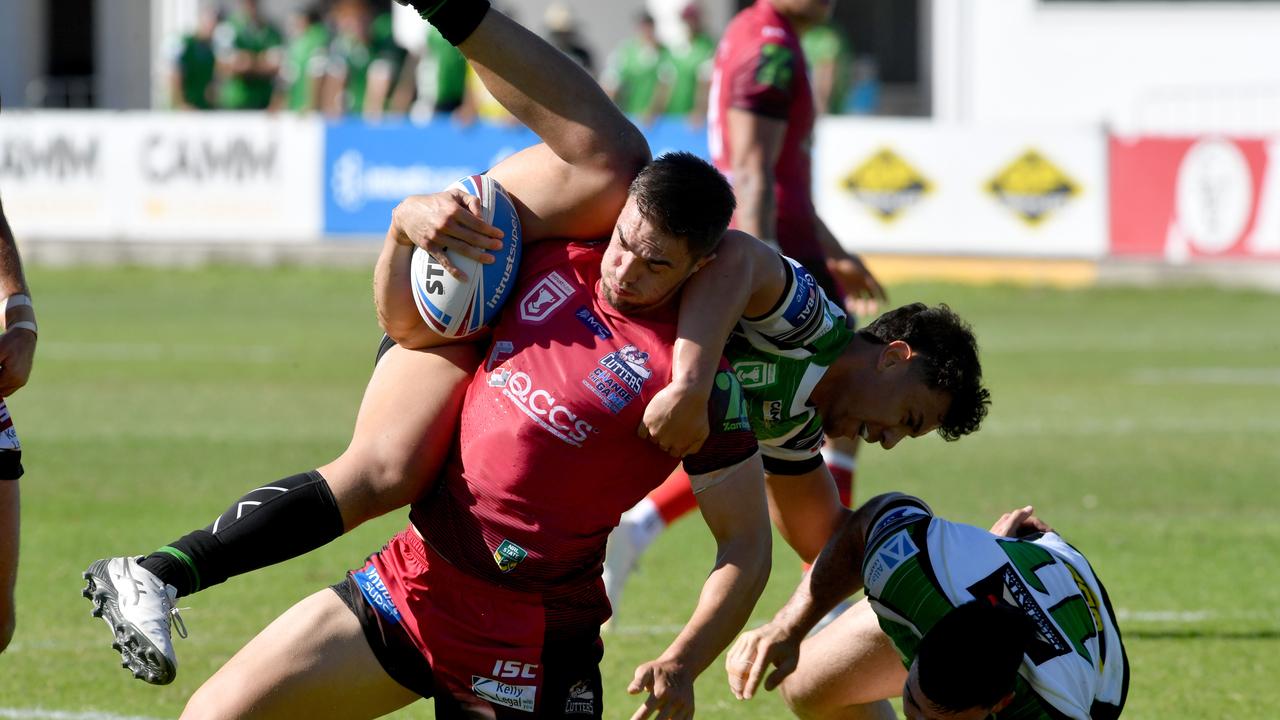 Mackay Cutters Kane Bradley attempts to evade a tackle against the Townsville Blackhawks. Picture: Evan Morgan.