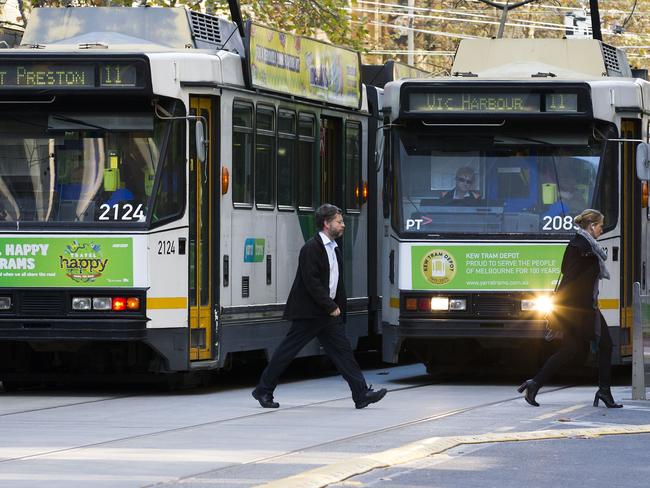 Pedestrians run in front of tram as it leaves tram stop on Collins street near Elisabeth street. COLLINS St remains MelbourneÕs worst road for tram accidents with more than 200 incidents in the past four years. There have been renewed calls to separate trams and cars with 209 accidents reported on Collins Street between 2010 and 2014. The intersection of Collins and Elizabeth streets is MelbourneÕs worst accident black spot with 108 safety incidents since 2010, including 81 tram and vehicle collisions. Safety incidents include tram and vehicle collisions, passenger falls, and incidents involving pedestrians. Another high risk crash spot is the intersection of Collins and Spencer St with 101 safety incidents and 70 tram and vehicle collisions since 2010. Picture: Sarah Matray