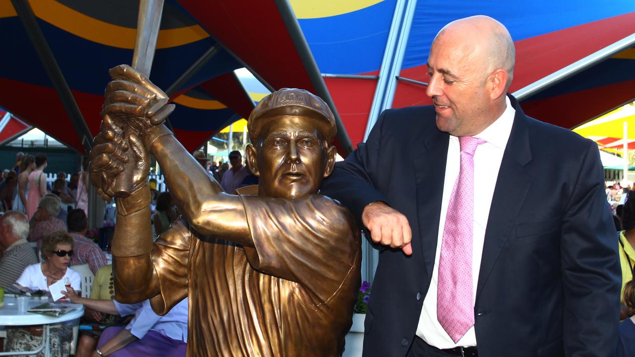 Lehmann, posing with his bronze statue, woke with chest pains on his 50th birthday. Picture: Ben Macmahon