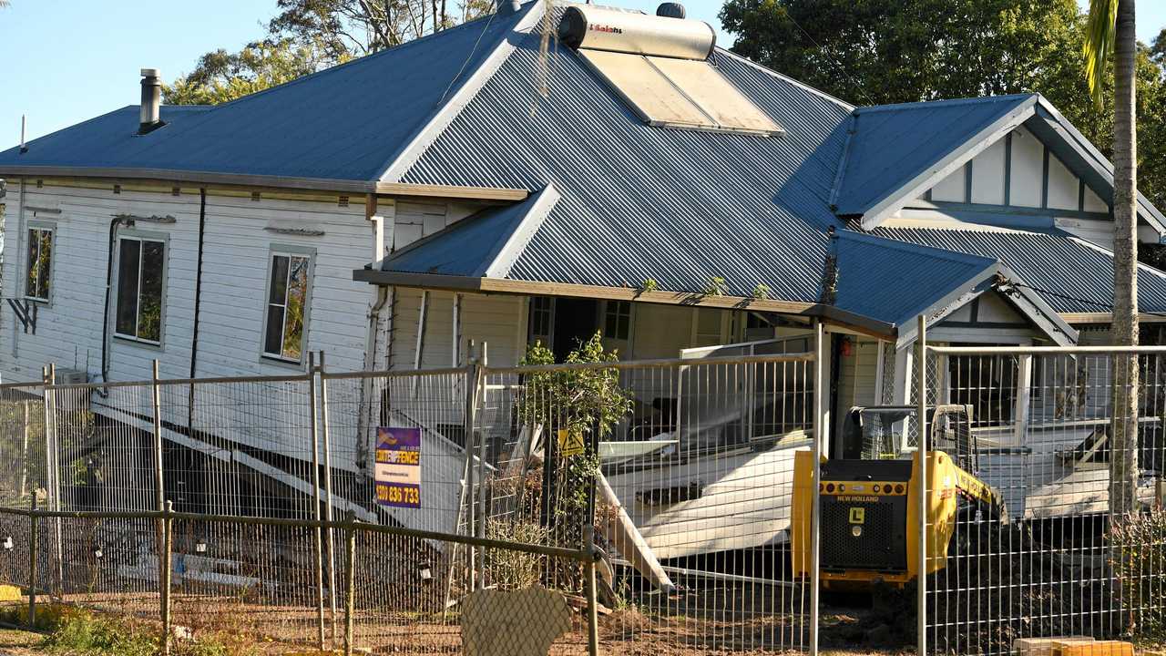 A house in South Lismore appears to have lost structural support and fallen. Picture: Marc Stapelberg