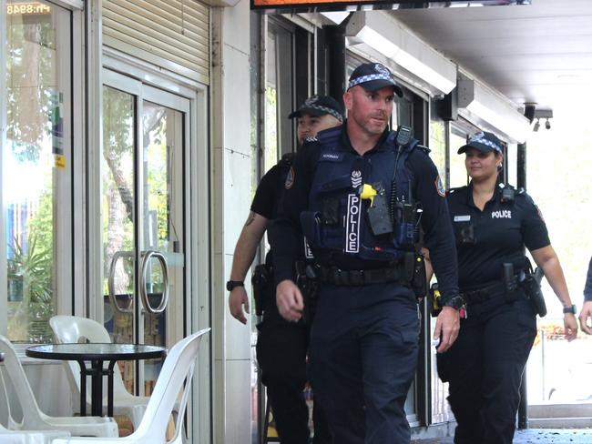 Officer in charge of NT Police's Territory Safety Division Acting Senior Sergeant Alex Noonan leads a foot patrol through the Nightcliff mall. Picture: Jason Walls