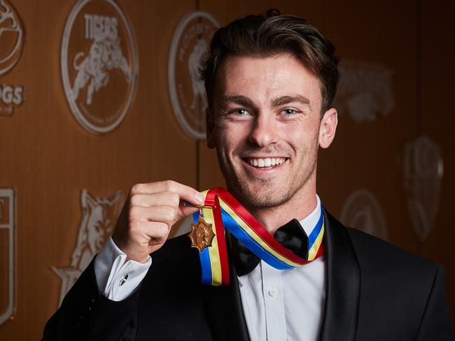 Luke Partington poses for a picture with the Magarey Medal at Adelaide Oval in North Adelaide, after receiving the honour, Monday, Sept. 9, 2019. Picture: MATT LOXTON