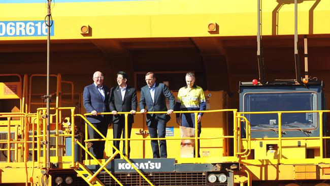 On tour ... Prime Minister Tony Abbott and the Japanese Prime Minister Shinzo Abe with CEO Rio Tinto Sam Walsh with the chief executive Andrew Harding during their visit to Rio Tinto’s West Angelas iron ore mine. Picture: Gary Ramage