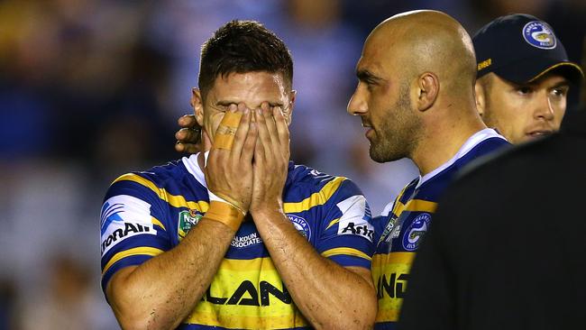 A shattered Mitchell Moses with Tim Mannah after missing the final conversion.