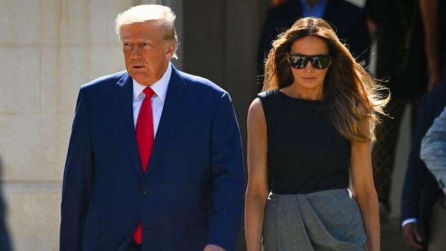 Donald Trump and wife Melania leave a polling station after voting in the US mid-term elections in Palm Beach, Florida. Picture: AFP