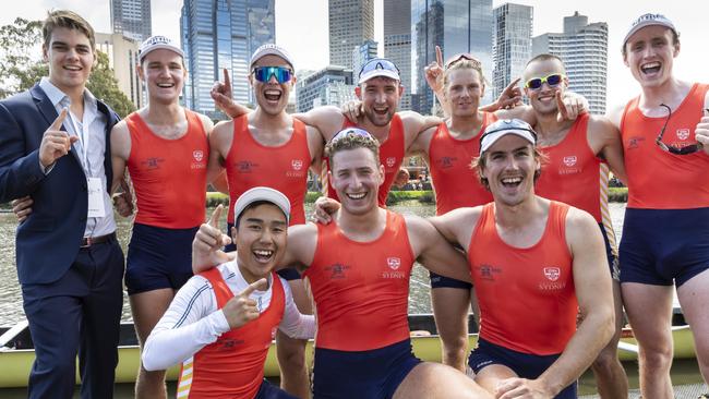 The men’s team celebrates their victory by the Yarra River. Picture: Tobias Titz