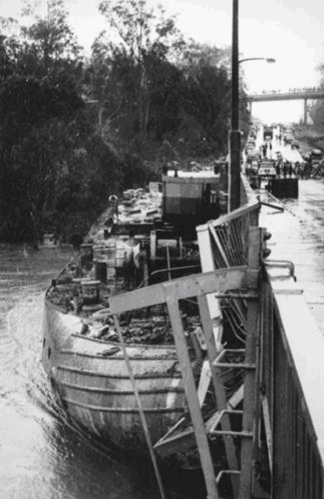 Flood damage at the bridge in 1974 has contributed to its poor condition. This barge was washed on to the upstream side, at one stage threatening to cause the bridge to collapse.