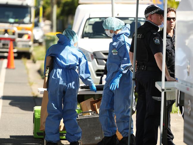 Forensic police at the scene of a double murder at Caboolture. Photographer: Liam Kidston.