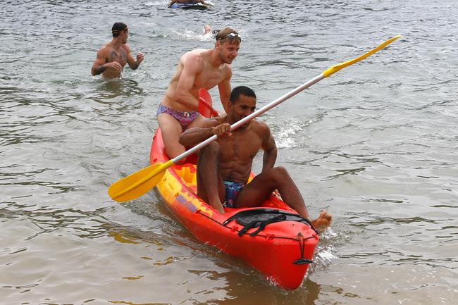 Gold Coast Suns players Touk Miller (front) and George Horlin-Smith training at Palm Beach. Picture: Tertius Pickard