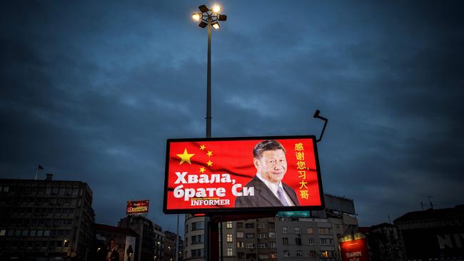 A billboard bearing Chinese President Xi Jinping's face looking down over a boulevard next to the words ‘Thank you brother Xi’, a message paid for and by a pro-government tabloid. Picture: AFP