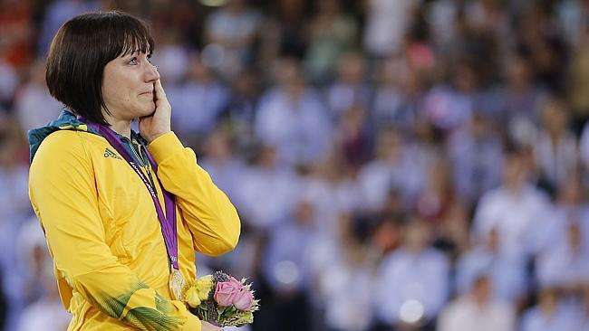 Cyclist Anna Meares of Australia poses with the gold medal during the medal ceremony of the women's sprint at the London 201...
