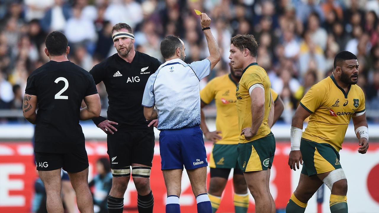 Tolu Latu of the Wallabies leaves the field after receiving a yellow card.