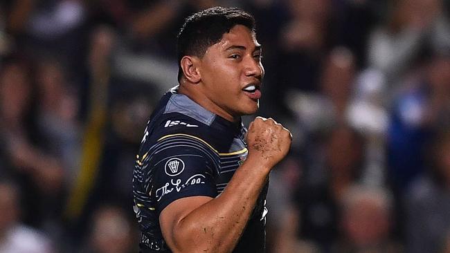 Jason Taumalolo of the Cowboys celebrates after scoring a try.