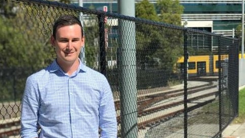 Bonney MP Sam O'Connor outside what would be the start of spur line for light rail to future link to Harbour Town at Biggera Waters.