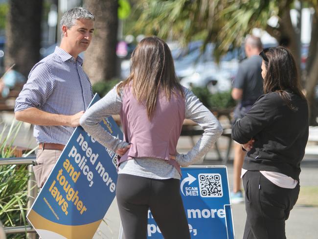 LNP candidate Hermann Vorster speaking with locals in Burleigh on Friday August 9.