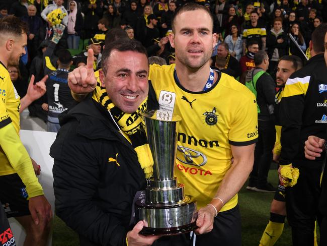 Heidelberg United president Steve Tsalikidis celebrates the title with Reuben Way. Picture: AAP