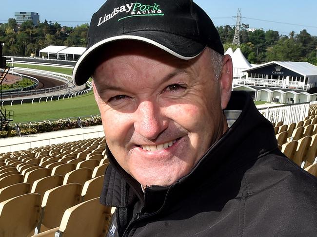 Breakfast with the Stars as Melbourne Cup horse's gallop the course proper at Flemington Racecourse. Trainer, David Hayes in the Grandstand. Picture Jay Town.